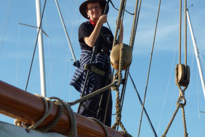 A picture of Claudia Myatt on board a board